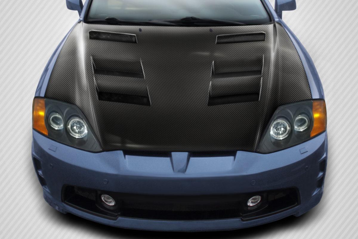 2003-2006 Hyundai Tiburon Carbon Creations AM-S Carbon Fiber Hood - Image 1