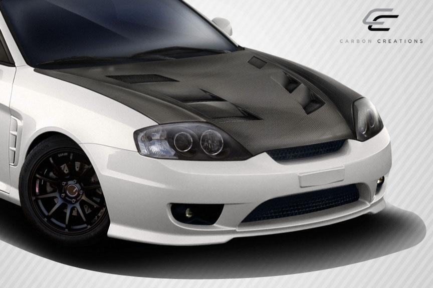 2003-2006 Hyundai Tiburon Carbon Creations AM-S Carbon Fiber Hood - Image 2