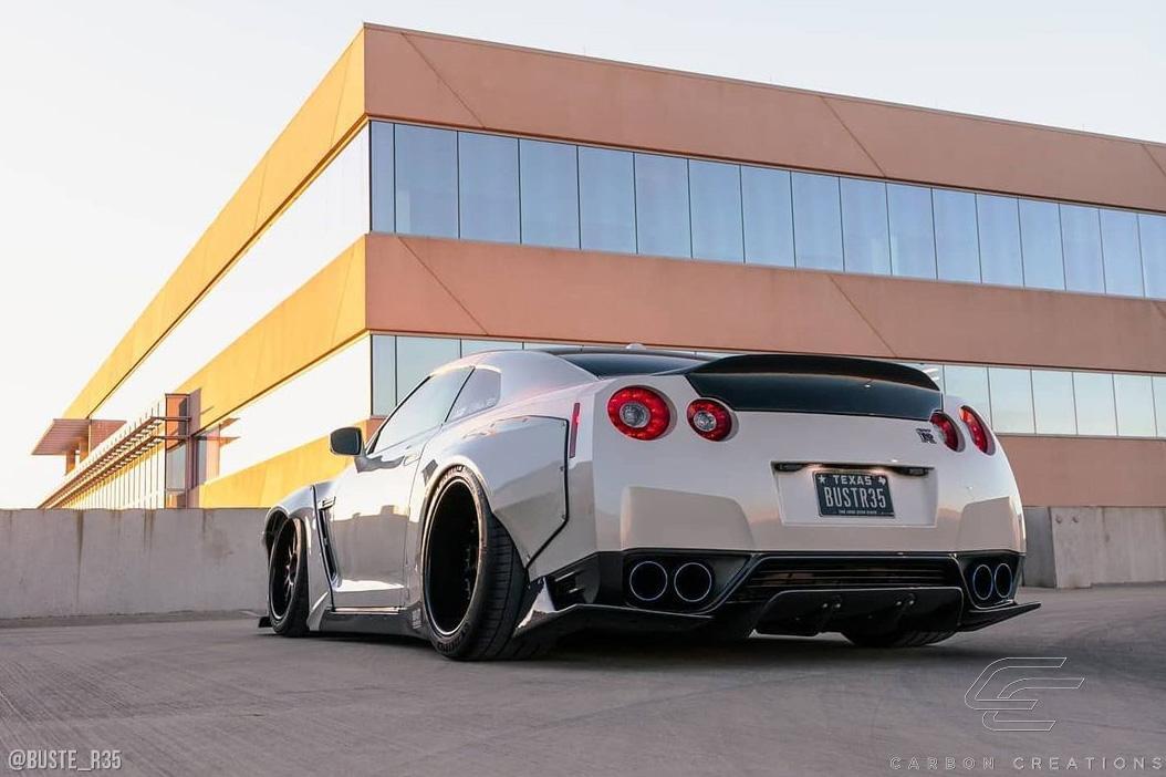 2009-2016 Nissan GTR Carbon Creations LBW Carbon Fiber Rear Lip - Image 3