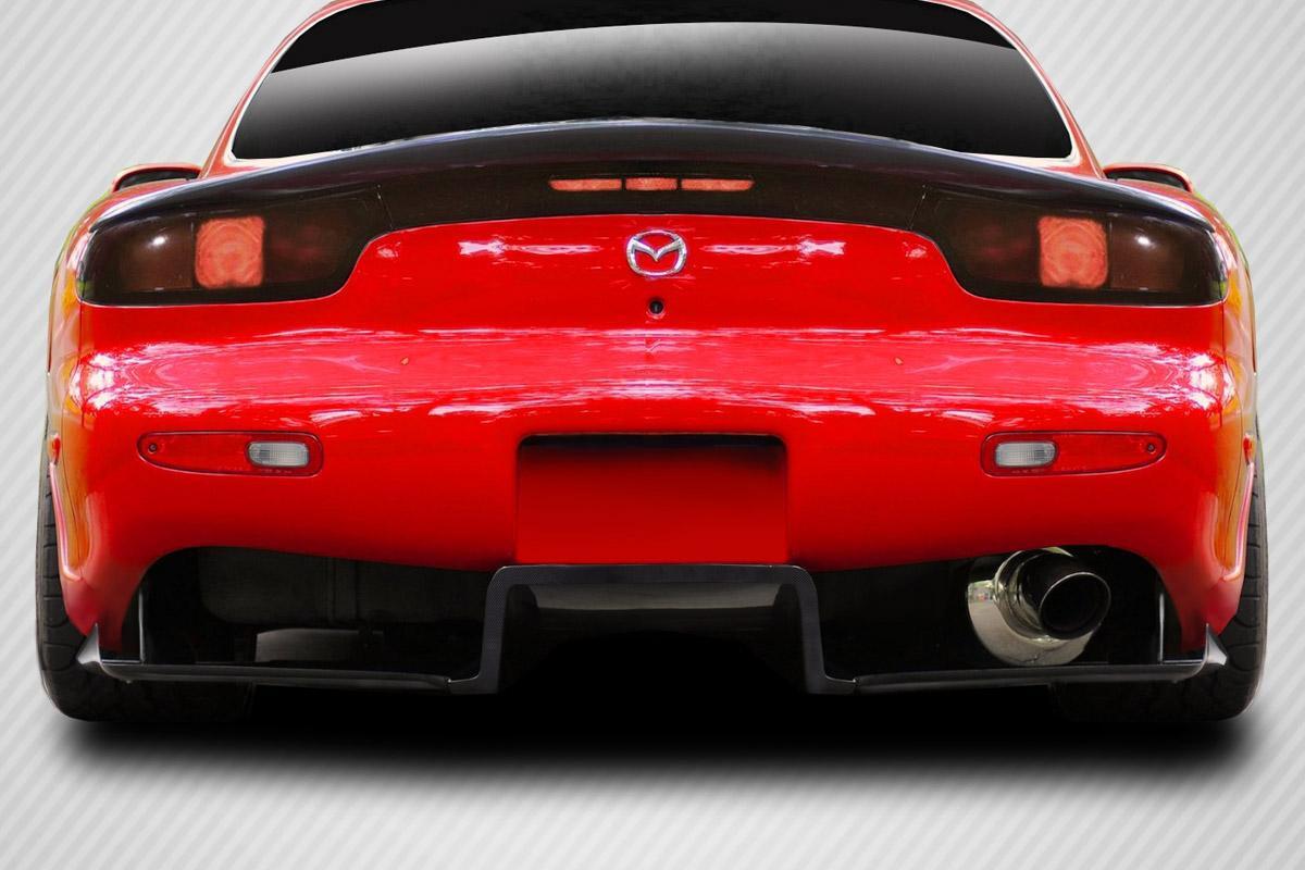 1993-1997 Mazda RX7 Carbon Creations RE-GT Carbon Fiber Rear Lip - Image 1