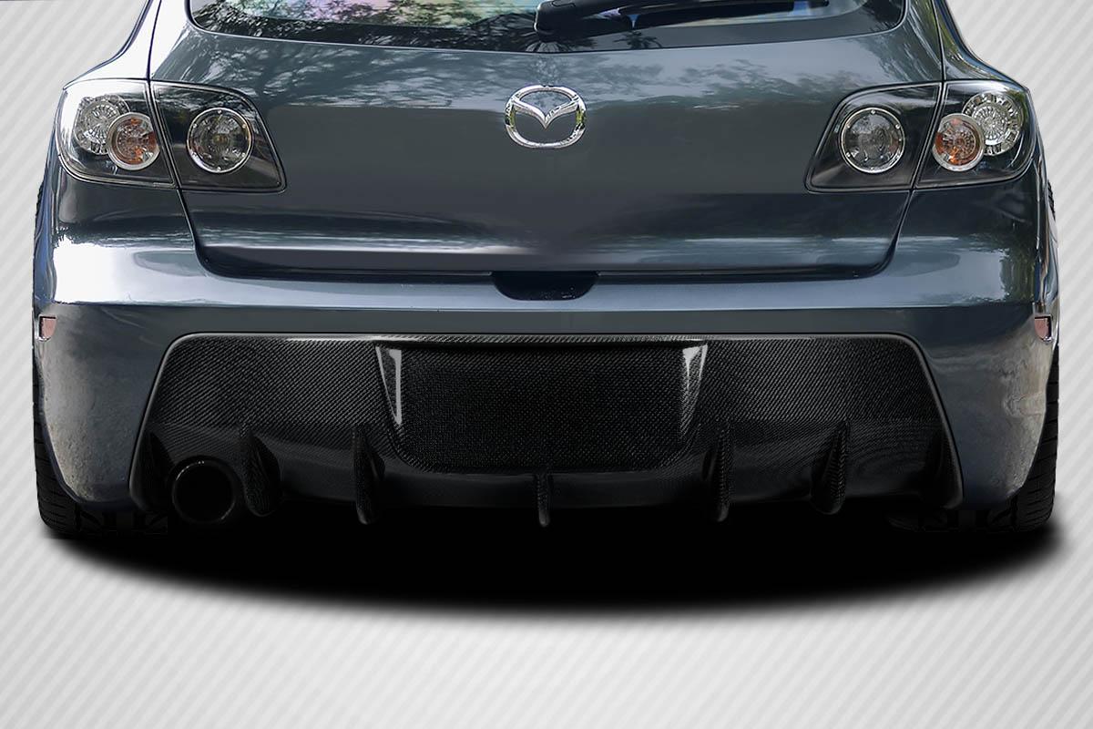 2004-2009 Mazda 3 Carbon Creations Corkscrew Carbon Fiber Rear Lip - Image 1