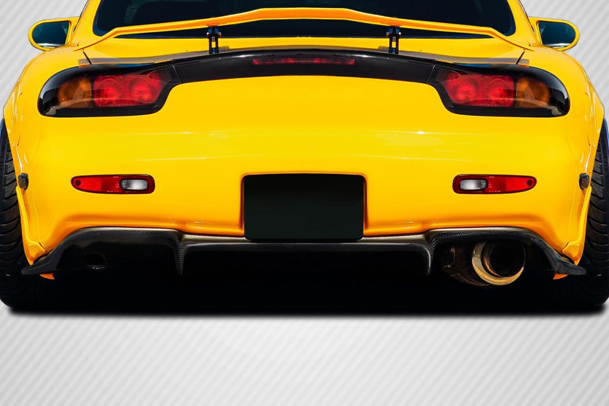 1993-1997 Mazda RX7 Carbon Creations GT Spec Carbon Fiber Rear Lip - Image 1