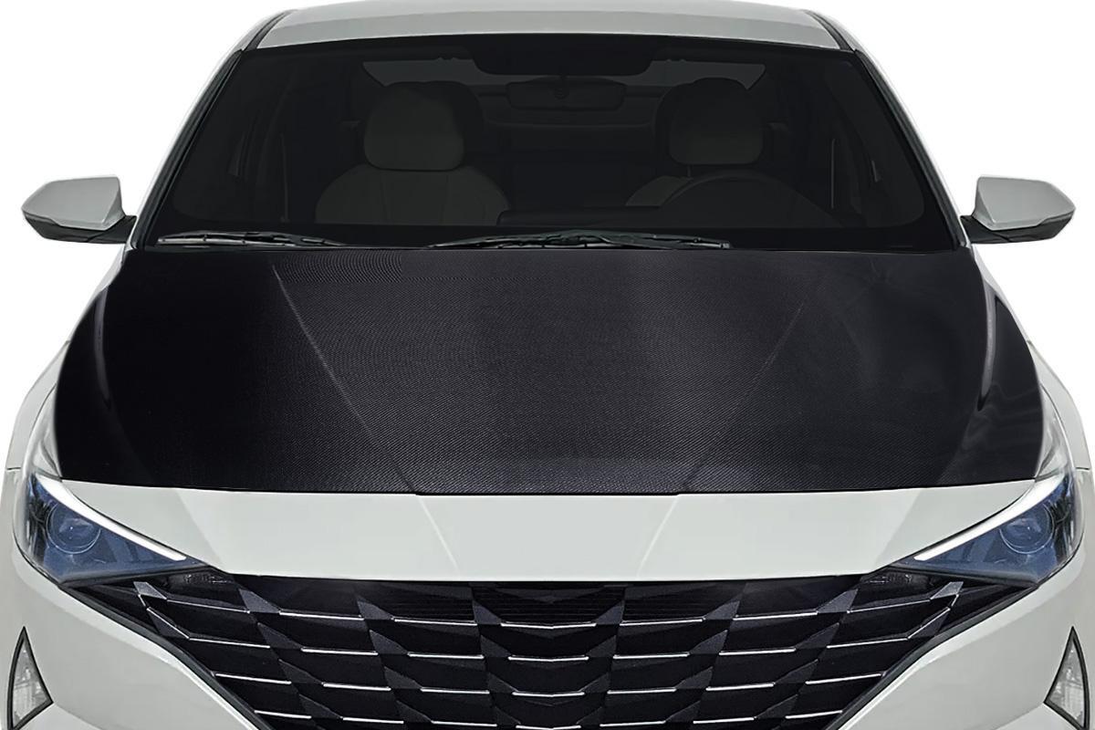 2021-2023 Hyundai Elantra Carbon Creations OEM Look Carbon Fiber Hood - Image 1